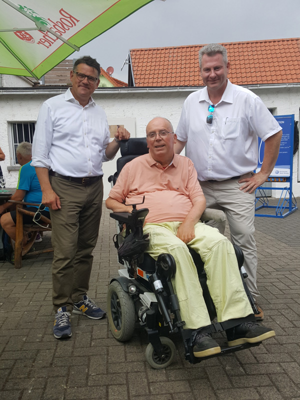 Sie sprachen über die 85 barrierefreien Wohnungen des Vereins und dass ein weiterer Bauabschnitt den 3 bestehenden folgen soll.